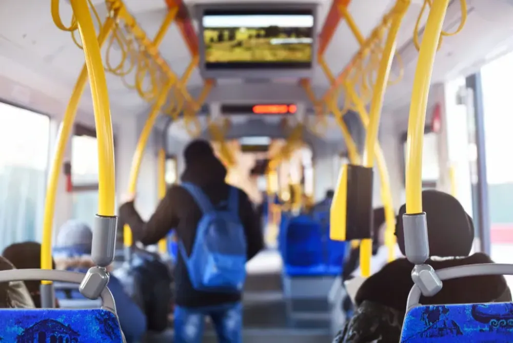 Blurry photo of the inside of a city tram